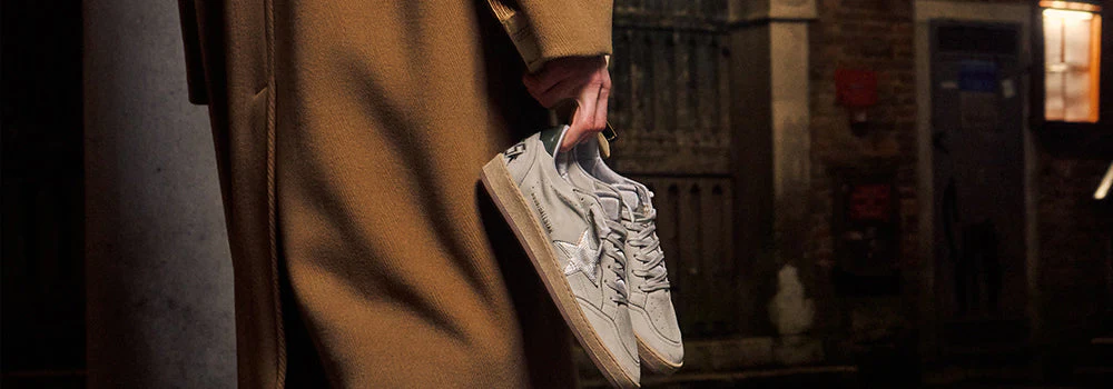 Golden Goose Slide Sneakers with the brand proposition which